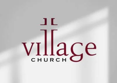 Village Church Khandallah logo with two LLs in forming a cross at the top