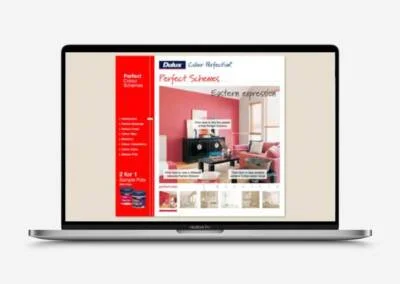 Laptop displaying Dulux Perfect Schemes website