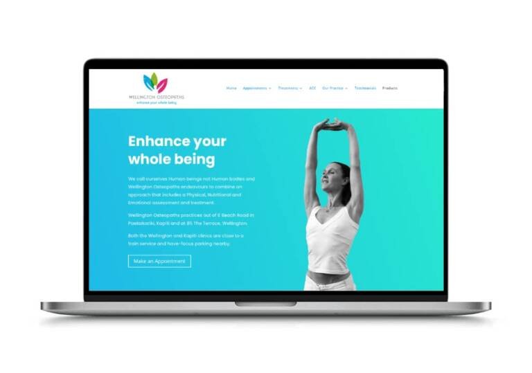 Laptop screen displaying the home page of Wellington Osteopaths website. The website shows a person smiling and stretching.