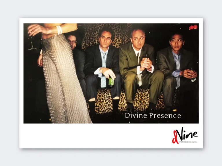 Picture shows a group of men seated on a sofa drinking beer and looking at someone carrying a glass of 'Divine' Martinborough Wine with the headline 'Dine Presence