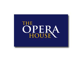The Opera House" sign on blue background.