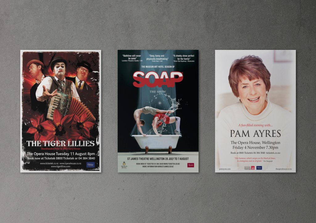 Three event posters on a wall.