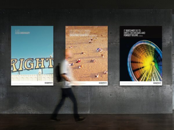 Gallery wall with inspirational quote posters and walking person.