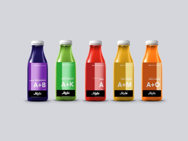 Assorted fruit juice bottles lined up.